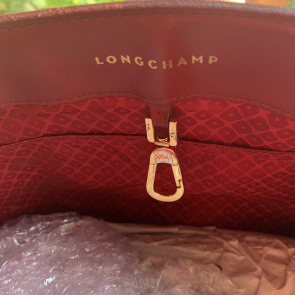 PLUM RED LONGCHAMP MINIMAL BEAUTY: crossbody, spacious, feminine. Leather bag. - Picture 3 of 17